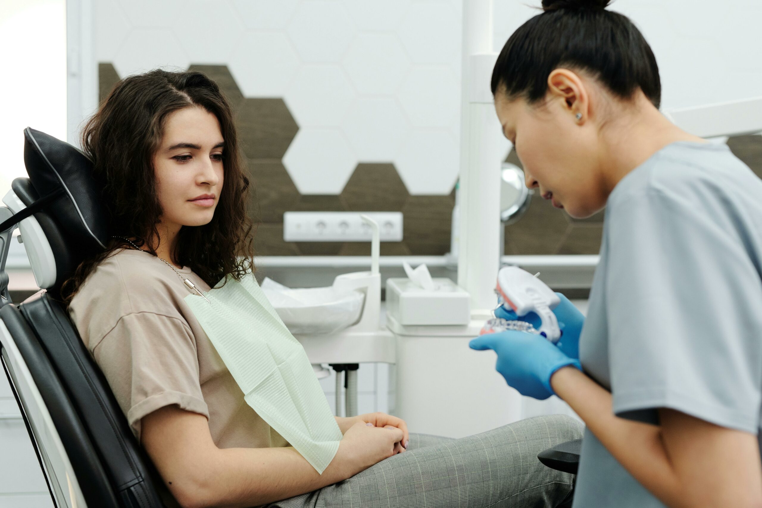 Dental Assistant With a Patient